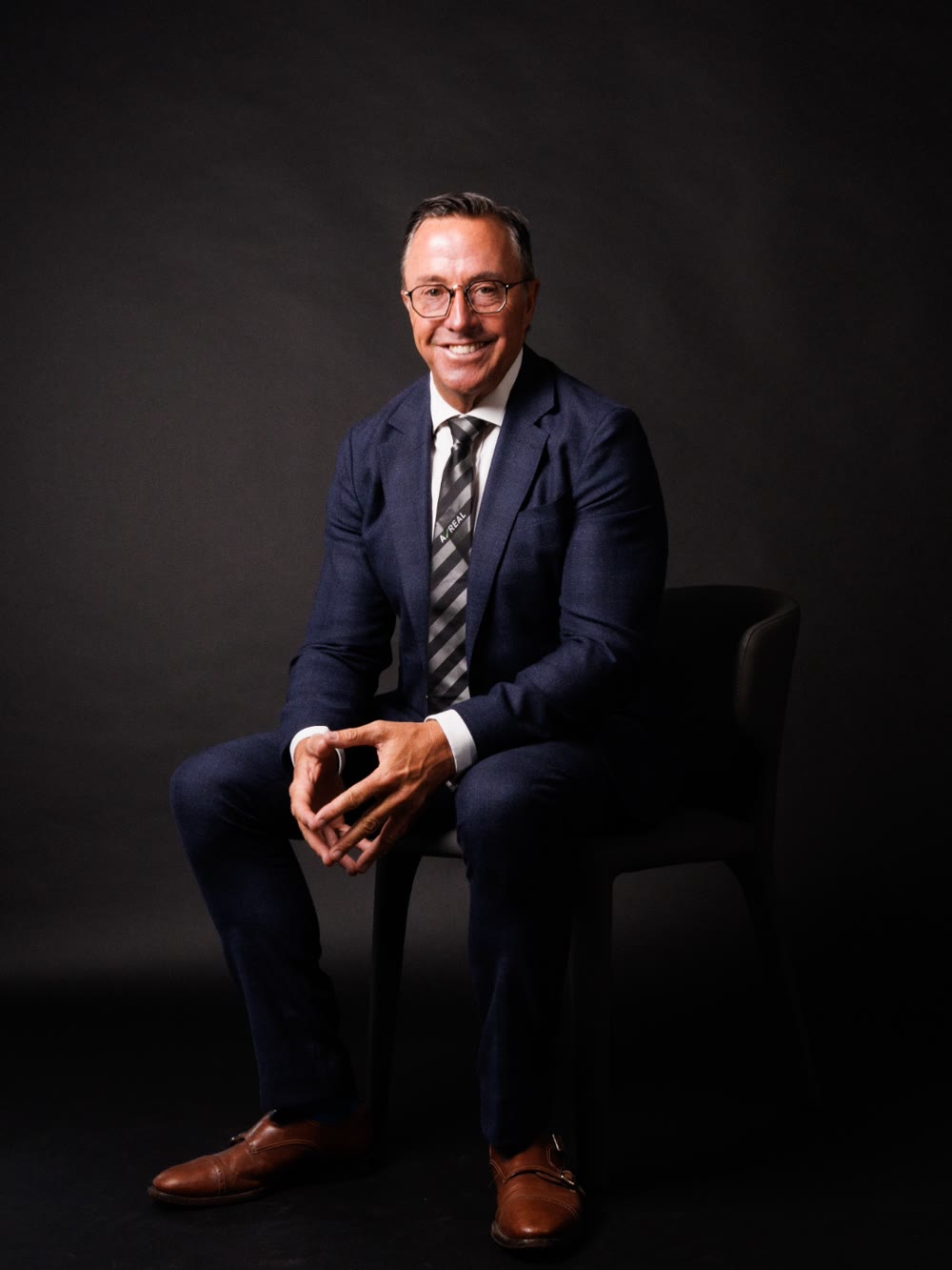 Warren Tate, Licensed Estate Agent, Auctioneer and Coach